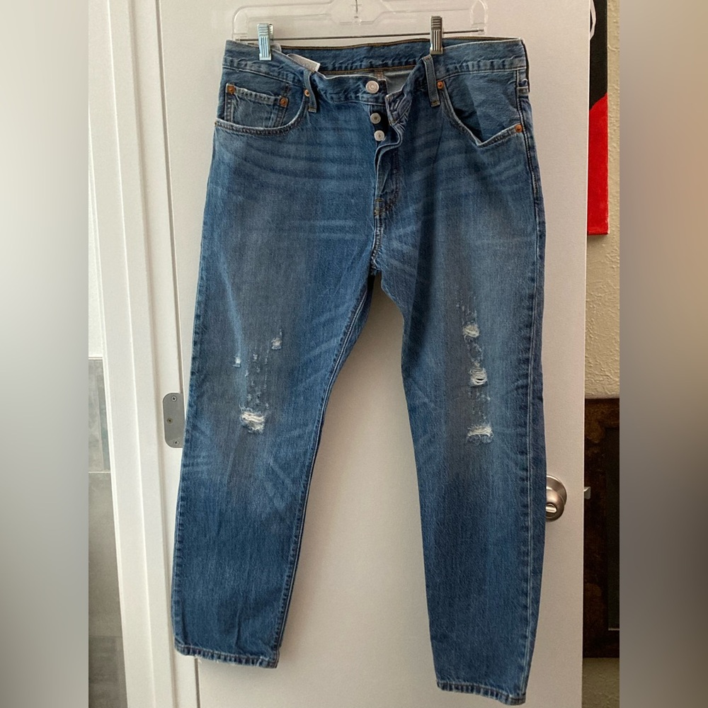 Levi's Relaxed Fit Blue Jeans with Distressed Details